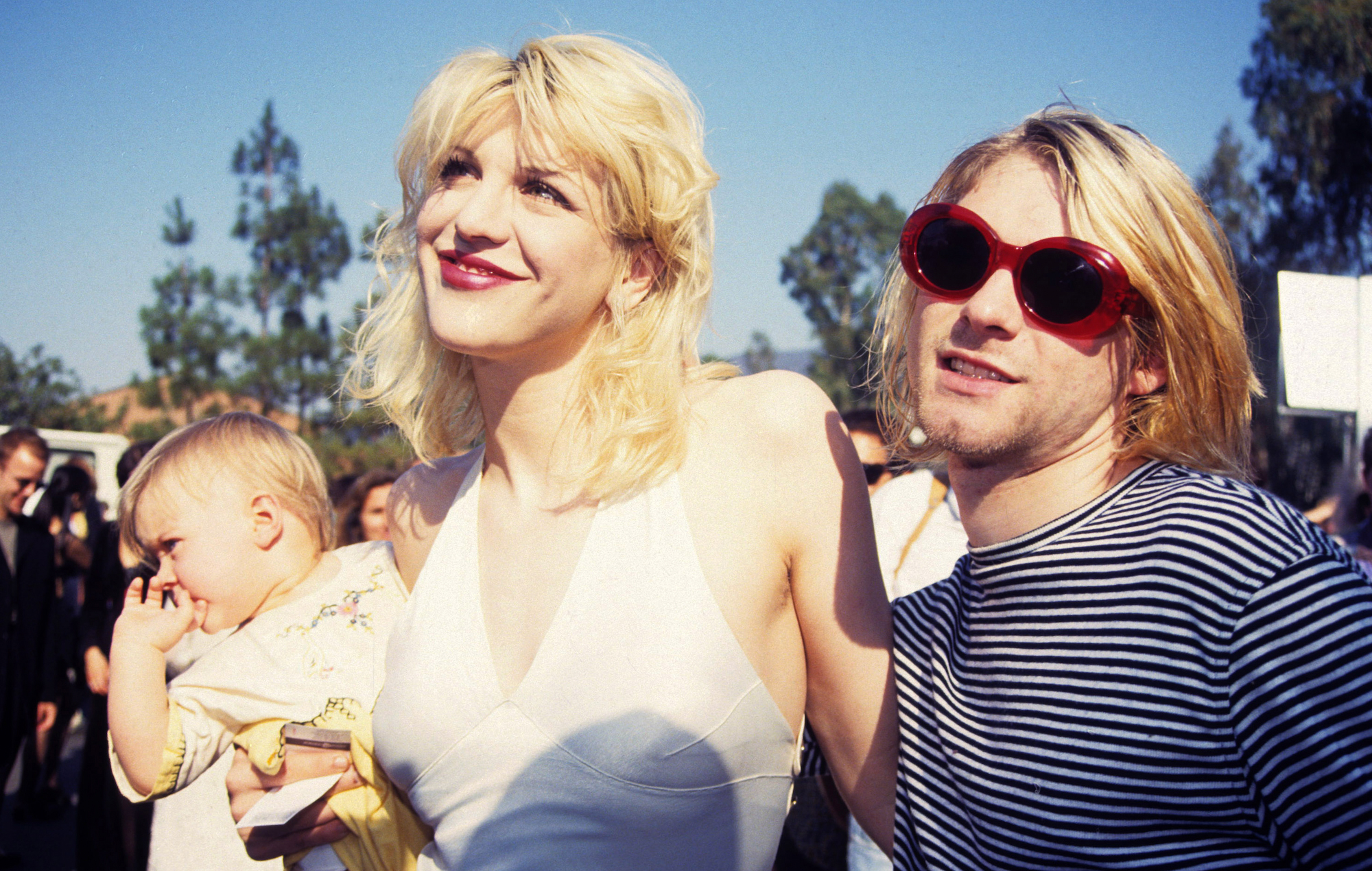 Courtney Love and Kurt Cobain, with daughter Francis Bean Cobain, at the 1993 MTV Video Music Awards. Credit: Terry McGinnis/WireImage