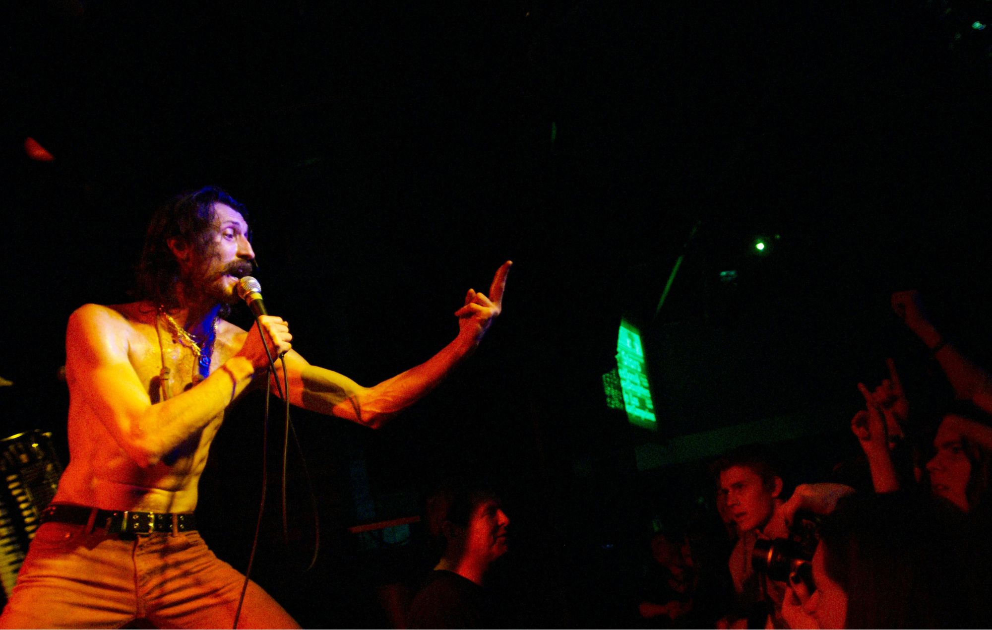 Eugene Hutz of Gogol Bordello performing on stage at The Leadmill in Sheffield