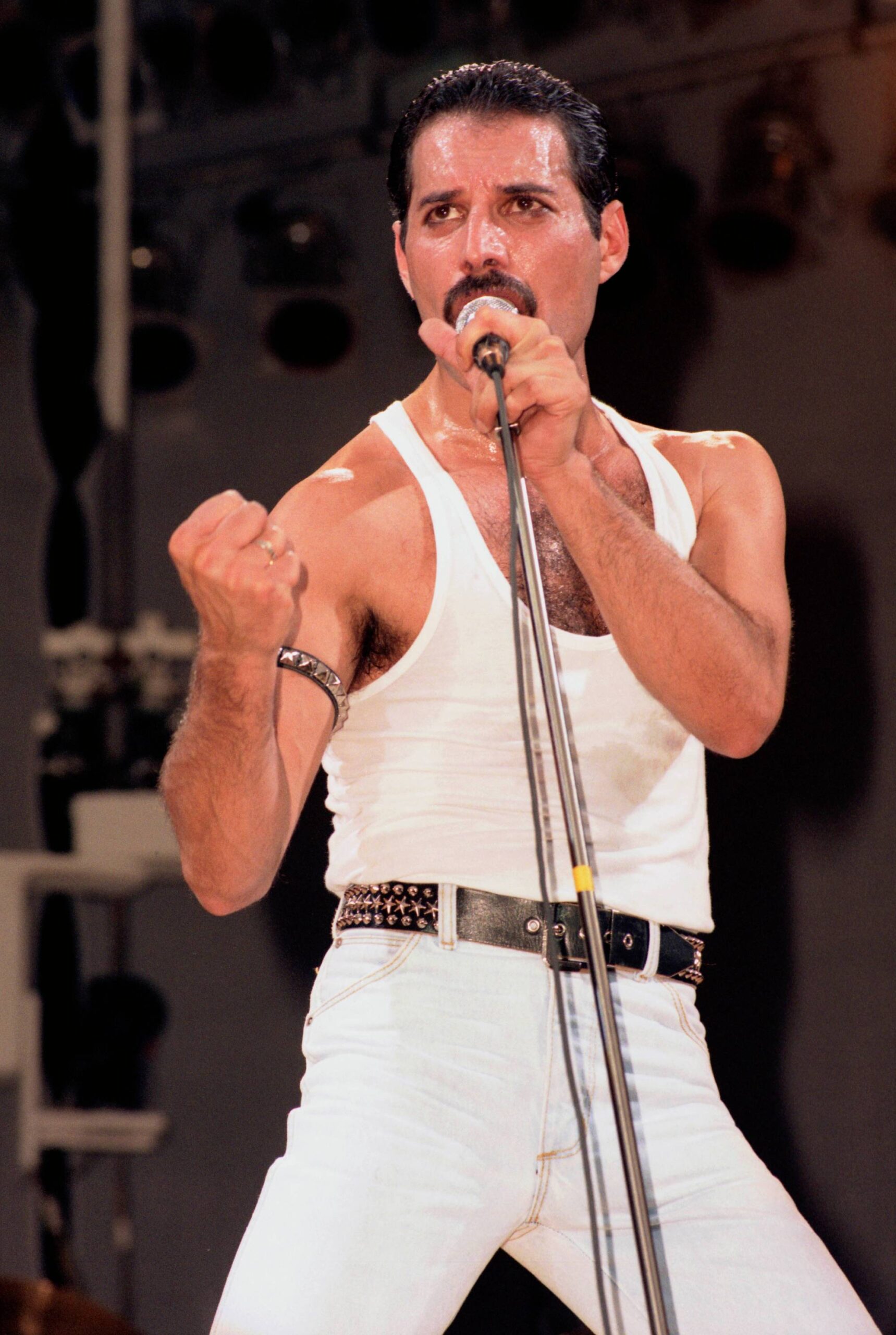 Freddie MERCURY and LIVE AID and QUEEN, Freddie Mercury performing live on stage at Live Aid (Photo by Phil Dent/Redferns)