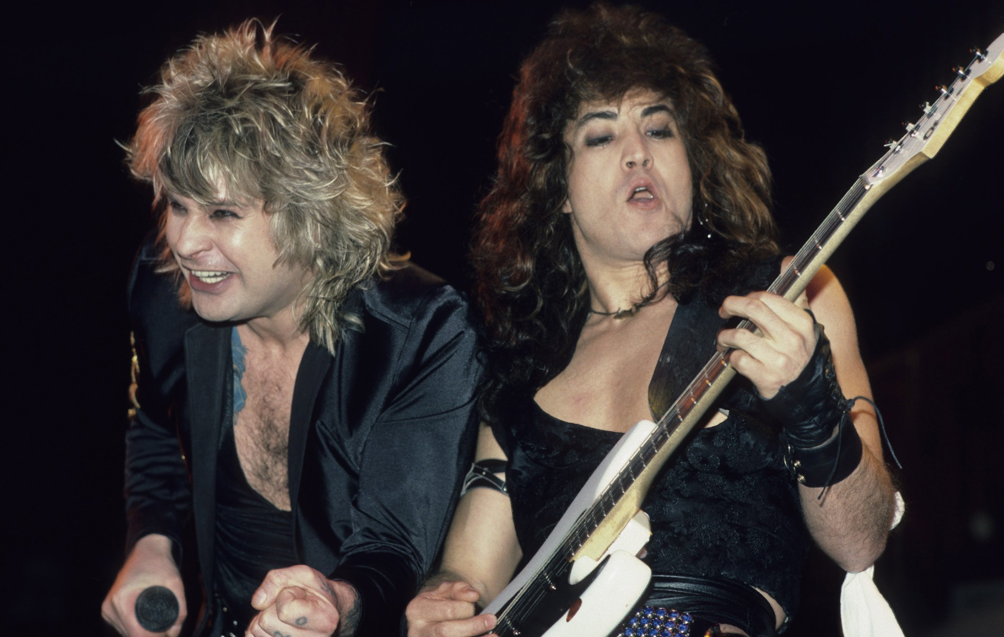 Ozzy Osbourne and Jake E. Lee performing live on stage