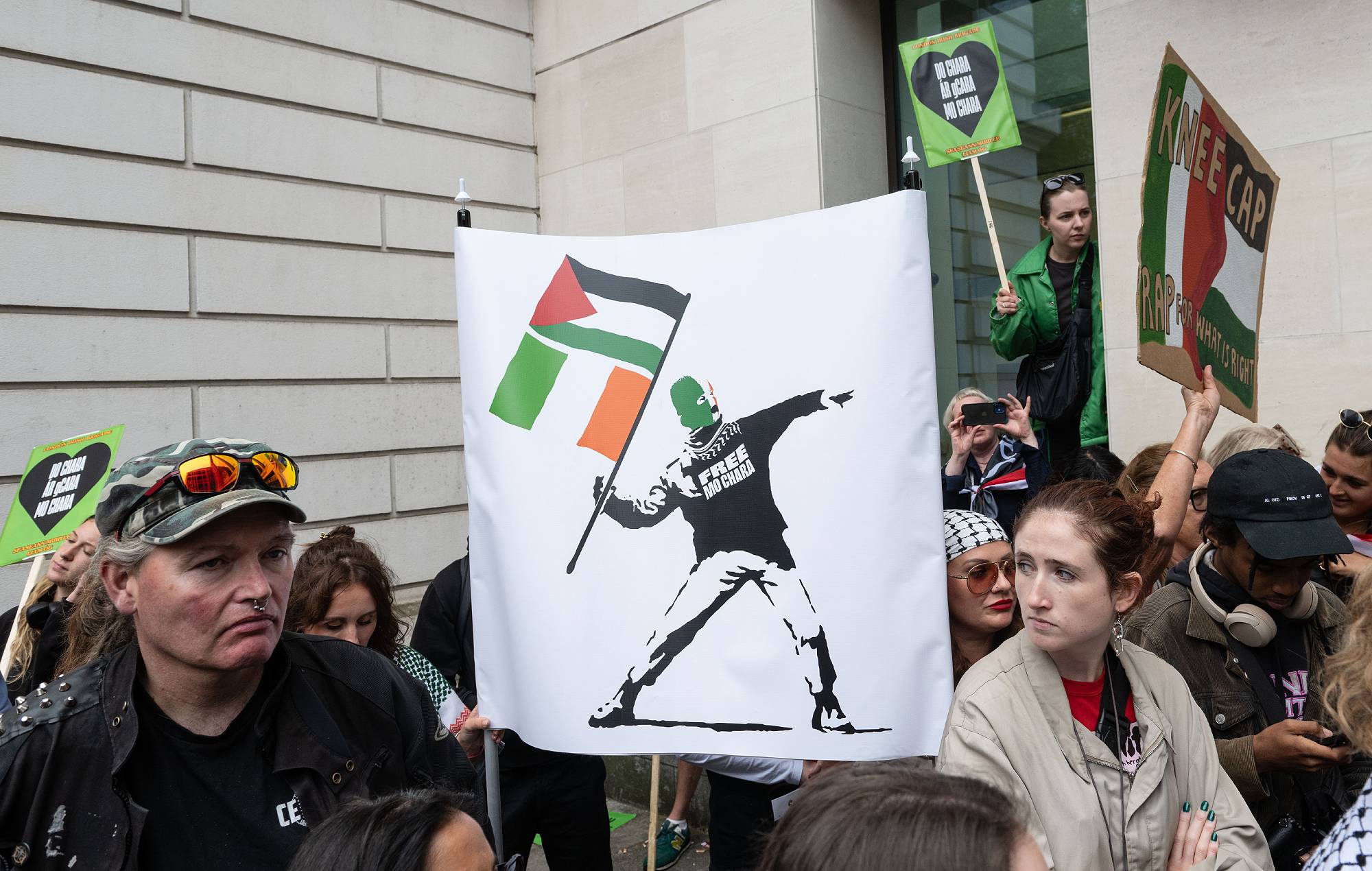 Protesters gather outside Westminster Magistrates' Court in London during the appearance of Liam Og O hAnnaidh, known as Mo Chara from Kneecap (Photo by Thomas Krych/Anadolu via Getty Images)