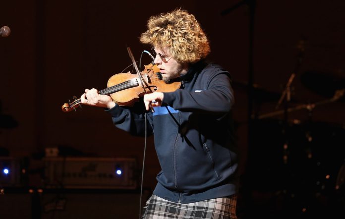 Ashley MacIsaac performs on stage at Carnegie Hall